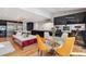 Dining area adjacent to the kitchen features modern furnishings, stainless appliances, and an island with seating at 4070 Whitewater Creek Nw Rd, Atlanta, GA 30327
