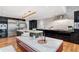 Spacious kitchen features a large island, stainless steel appliances and a marble backsplash at 4070 Whitewater Creek Nw Rd, Atlanta, GA 30327