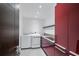 Modern laundry room featuring sleek cabinetry, stainless steel sink, and convenient washer and dryer at 4070 Whitewater Creek Nw Rd, Atlanta, GA 30327