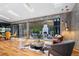 Bright living room with an outdoor fireplace at 4070 Whitewater Creek Nw Rd, Atlanta, GA 30327