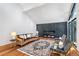 Stylish living room features a modern fireplace and ample natural light at 4070 Whitewater Creek Nw Rd, Atlanta, GA 30327