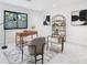 Bright office space with modern furnishings, a large window, and a patterned rug at 4070 Whitewater Creek Nw Rd, Atlanta, GA 30327