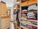 Walk-in closet with custom shelving and storage solutions at 5021 Heatherwood Ct, Roswell, GA 30075