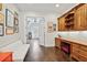 Hallway features a built-in desk with cabinets and drawers for storage and display at 5021 Heatherwood Ct, Roswell, GA 30075