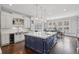Spacious kitchen featuring a large island with seating, and high-end appliances creating a chef's dream at 5021 Heatherwood Ct, Roswell, GA 30075