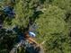 Aerial view of blue house and surrounding trees at 1565 Ocala Sw Ave, Atlanta, GA 30311