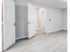 Spacious basement with neutral walls and vinyl flooring at 1565 Ocala Sw Ave, Atlanta, GA 30311