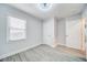 Well-lit bedroom with neutral walls and hardwood floors at 1565 Ocala Sw Ave, Atlanta, GA 30311