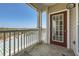 Balcony area with outdoor views and a red door at 4333 Dunwoody Park Dr # 3406, Dunwoody, GA 30338