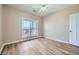 Bedroom with a view, natural light, ceiling fan, and stylish flooring at 4333 Dunwoody Park Dr # 3406, Dunwoody, GA 30338