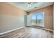 Bedroom featuring a window view, ceiling fan, and plank flooring at 4333 Dunwoody Park Dr # 3406, Dunwoody, GA 30338