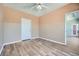 Bedroom with ceiling fan, gray plank flooring, and neutral two-tone paint at 4333 Dunwoody Park Dr # 3406, Dunwoody, GA 30338