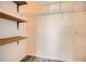 Walk-in closet with shelves and rod for ample storage at 4333 Dunwoody Park Dr # 3406, Dunwoody, GA 30338
