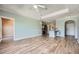 Bright living room open to kitchen with modern flooring, ceiling fan and plenty of space at 4333 Dunwoody Park Dr # 3406, Dunwoody, GA 30338