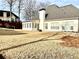 Backyard features a sunroom and patio at 100 Cottonwood Pl, Stockbridge, GA 30281