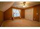 Bedroom features a ceiling fan, window, and closet at 100 Cottonwood Pl, Stockbridge, GA 30281