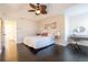 Inviting bedroom with dark wood floors and modern furnishings at 1605 Signal Flag Way, Lawrenceville, GA 30043