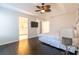 Spacious main bedroom with tray ceilings and a view into the bathroom at 1605 Signal Flag Way, Lawrenceville, GA 30043