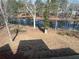 Picture of the backyard and lake with fallen leaves at 3900 Arbor Se Ln, Conyers, GA 30094