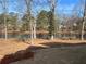 Picture of the backyard and lake with freshly laid sod at 3900 Arbor Se Ln, Conyers, GA 30094