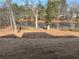 Picture of the backyard and lake with freshly laid sod at 3900 Arbor Se Ln, Conyers, GA 30094