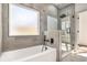 Modern bathroom features a soaking tub and glass-enclosed shower at 3900 Arbor Se Ln, Conyers, GA 30094