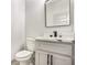 Stylish powder room featuring modern fixtures and a sleek design at 3900 Arbor Se Ln, Conyers, GA 30094