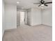 Cozy bedroom with neutral walls, carpet, ceiling fan, and connecting doorway to another room at 3900 Arbor Se Ln, Conyers, GA 30094