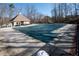 Community pool covered during off season. Enjoy the outdoors with this neighborhood pool and lounging area at 3710 Blackgold Dr, Buford, GA 30519