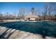 Community pool covered during off season. Enjoy the outdoors with this neighborhood pool and lounging area at 3710 Blackgold Dr, Buford, GA 30519