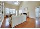 Airy living room featuring a fireplace, built-in shelves, and views to the bright kitchen at 3710 Blackgold Dr, Buford, GA 30519