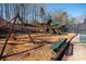 Community playground with swings and play structures for outdoor fun and recreation at 3710 Blackgold Dr, Buford, GA 30519