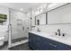 Modern bathroom with double vanity and walk-in shower at 4280 Atlanta St, Powder Springs, GA 30127