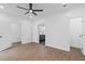 Bright bedroom with wood-look floors and access to bath at 4280 Atlanta St, Powder Springs, GA 30127