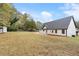 Modern farmhouse exterior, spacious backyard, storage shed at 4280 Atlanta St, Powder Springs, GA 30127