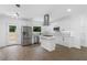 Modern kitchen with white cabinets and island at 4280 Atlanta St, Powder Springs, GA 30127