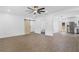 Open living room with LVP flooring and barn door at 4280 Atlanta St, Powder Springs, GA 30127