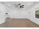 Bright living room with LVP flooring and ceiling fan at 4280 Atlanta St, Powder Springs, GA 30127