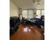 Spacious living room with hardwood floors and large TV at 57 Forsyth St Nw Apt 6E Nw St # 6E, Atlanta, GA 30303