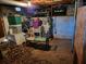 Unfinished basement area with storage and a water heater at 2369 Springdale Sw Rd, Atlanta, GA 30315