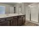 Bathroom with double vanity and large walk-in shower at 4351 Portsbrook Ave, Snellville, GA 30039