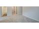 Spacious bedroom with plush carpeting and neutral walls at 4351 Portsbrook Ave, Snellville, GA 30039