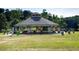 Relaxing community gazebo with picnic tables and lush green space at 4351 Portsbrook Ave, Snellville, GA 30039