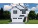 Two-story white farmhouse-style home with black shutters and a two-car garage at 4351 Portsbrook Ave, Snellville, GA 30039