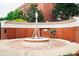 Brick memorial wall with fountain and inscription: Freedom is never free at 4351 Portsbrook Ave, Snellville, GA 30039