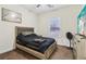 Bedroom with a full sized bed, ceiling fan and natural light from the window at 612 Cole Creek Dr, Dallas, GA 30157