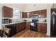 Modern kitchen featuring stainless steel appliances and ample counter space at 612 Cole Creek Dr, Dallas, GA 30157