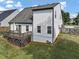 Exterior of the two-story house with a wooden deck and well-maintained lawn at 275 Creek View Ln, Acworth, GA 30102