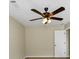 Bedroom with ceiling fan, neutral walls, carpet, and a white door at 275 Creek View Ln, Acworth, GA 30102