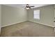 Bedroom featuring neutral tones and a ceiling fan at 275 Creek View Ln, Acworth, GA 30102